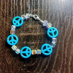 Turquoise beaded peace bracelet